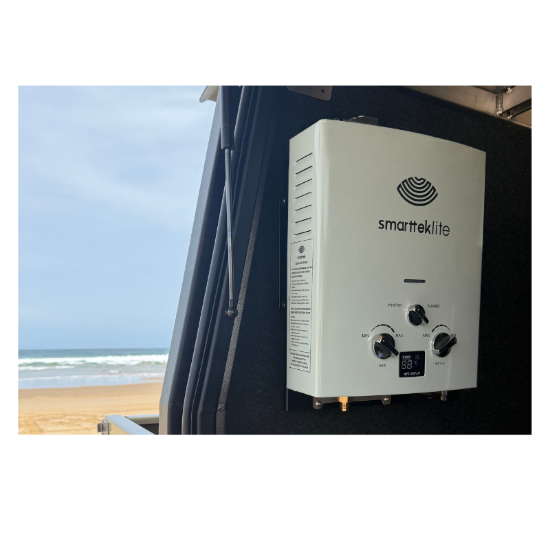 Smarttek Lite hot water unit mounted on a swing arm bracket fitted to a vehicle setup.