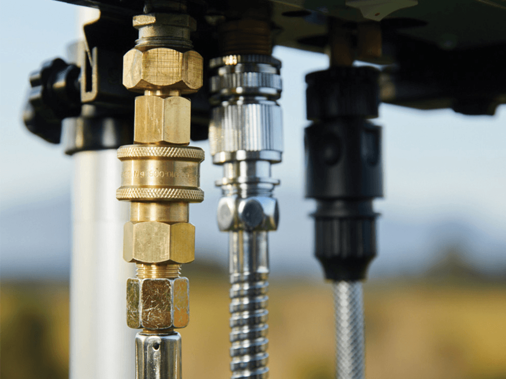 Smarttek Snap Pack quick connect fittings installed on a Smarttek hot water system.