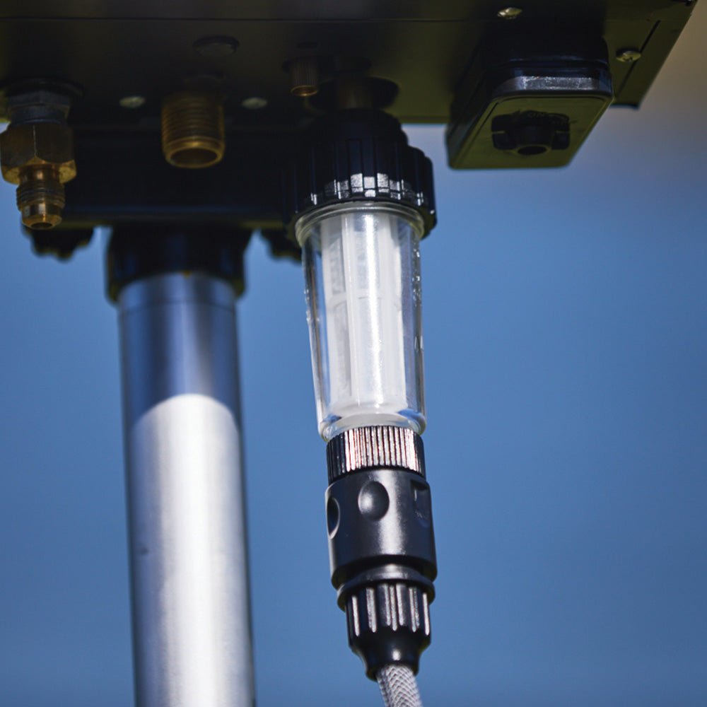 Smarttek water filter connected to the water inlet of a Smarttek hot water system.